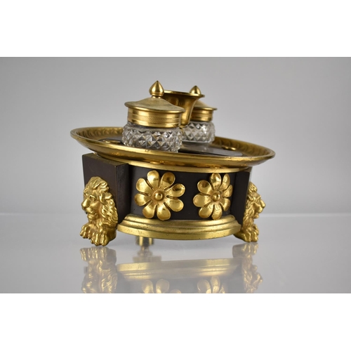 232 - A Regency Bronze and Gilt Ink Stand of Circular Footed Form complete with Two Cut Glass Inkwells Rai... 