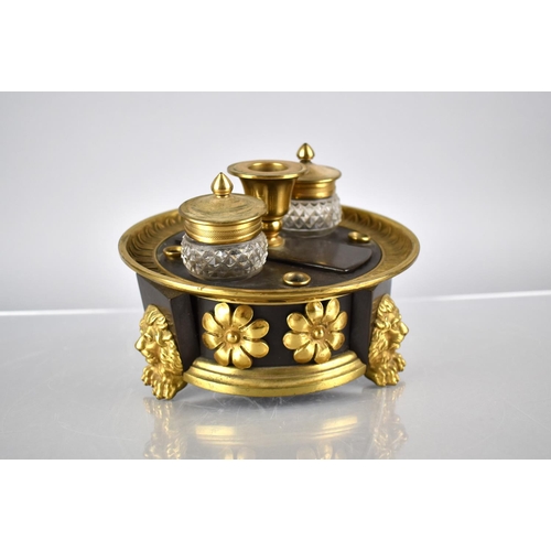 232 - A Regency Bronze and Gilt Ink Stand of Circular Footed Form complete with Two Cut Glass Inkwells Rai... 