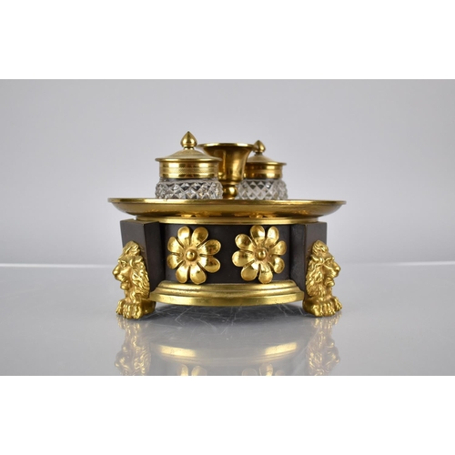 232 - A Regency Bronze and Gilt Ink Stand of Circular Footed Form complete with Two Cut Glass Inkwells Rai... 