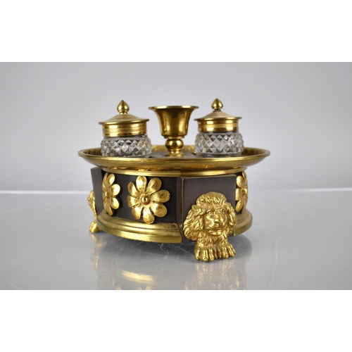 232 - A Regency Bronze and Gilt Ink Stand of Circular Footed Form complete with Two Cut Glass Inkwells Rai... 