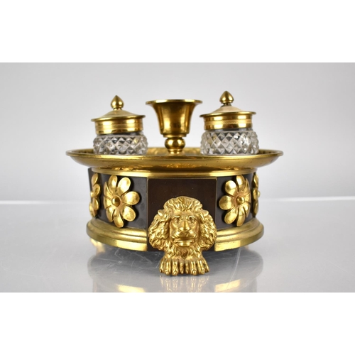 232 - A Regency Bronze and Gilt Ink Stand of Circular Footed Form complete with Two Cut Glass Inkwells Rai... 