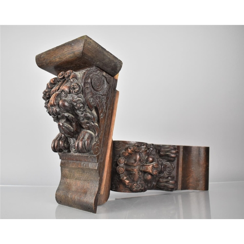 212 - A Pair of Early Carved Wooden Mounts with Lion Design, 29.5cms High and 14cms Deep