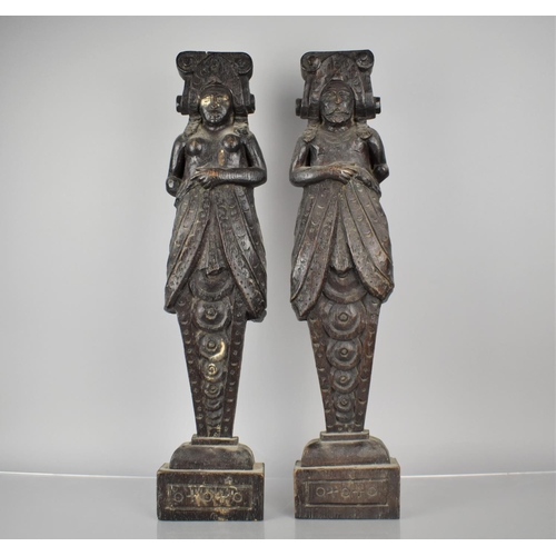 213 - A Pair of Early Carved Wooden Furniture Mounts in the Form of Standing Husband and Wife, 58cms High