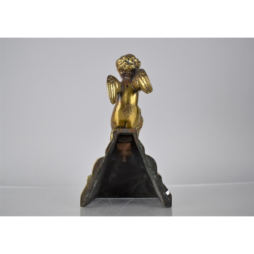 239 - A Polished Bronze Cherub in Seated Position, Lozenge Mark to Base, Mounted on Tapering Base, 18cms H... 