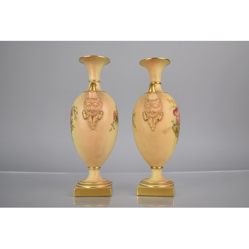 297 - A Pair of Royal Worcester Blush Ivory Vases decorated with Floral Bursts to Body and with Satyr Mask... 