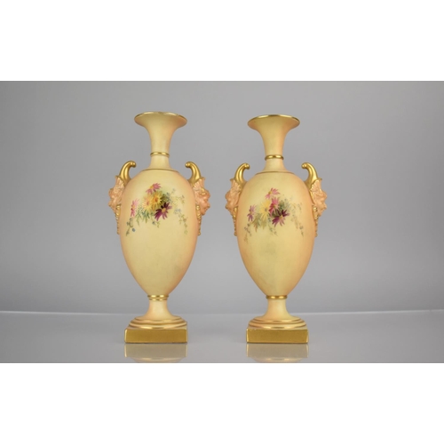 297 - A Pair of Royal Worcester Blush Ivory Vases decorated with Floral Bursts to Body and with Satyr Mask... 