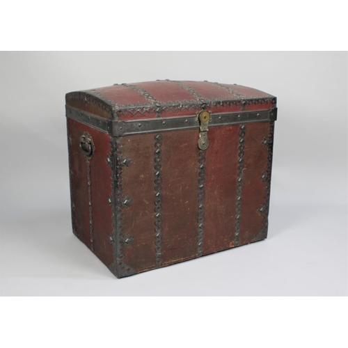 358 - A Late Victorian/Edwardian French Dome Topped Trunk with Decorative Banding and Studding