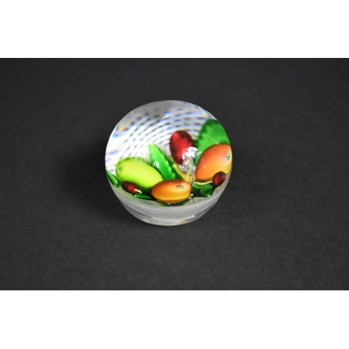 324 - A Small St. Louis Type Glass Paperweight decorated with Fruit on Lacework Base, 18cms Diameter