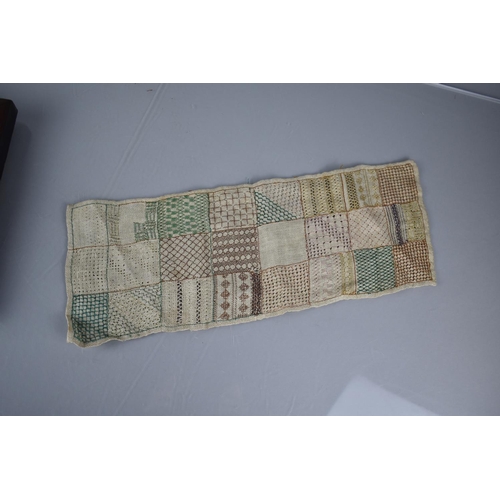 352 - A 19th Century Cushion Framed Sampler Dated 1852 together with Three Unframed Examples