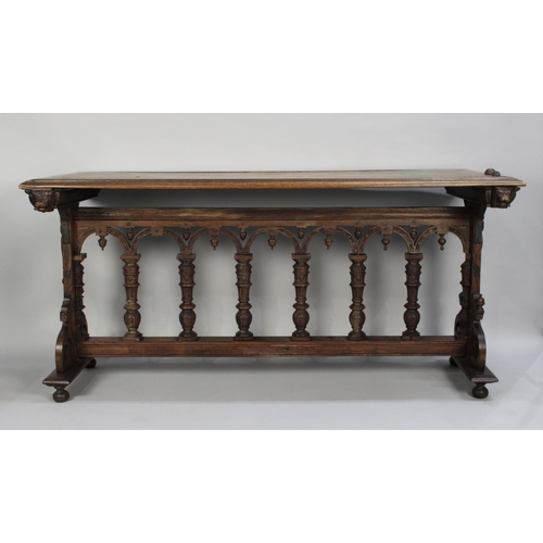 360 - A Gothic Oak Side Table with Carved Decoration, 174x75x82cm high