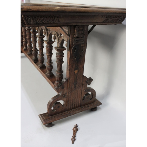 360 - A Gothic Oak Side Table with Carved Decoration, 174x75x82cm high