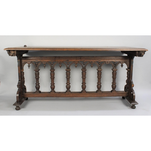 360 - A Gothic Oak Side Table with Carved Decoration, 174x75x82cm high