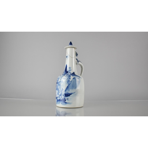 40 - A Chinese Porcelain Blue and White Water Bottle and Cover with Single Handle in the Form of Crawling... 