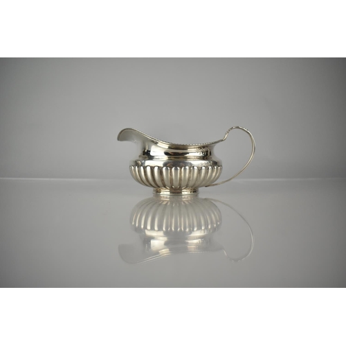 378 - A Georgian Silver Jug of Reeded Bellied Form by Michael Starkey, London Hallmark, 181g, 15.5x10x7cm ... 