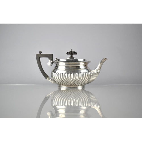 380 - An Edward VII Silver Teapot of Reeded Bellied Form by Fordham & Faulkner, Sheffield 1905, 402g, 23cm... 