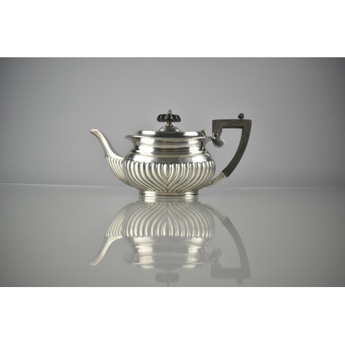 380 - An Edward VII Silver Teapot of Reeded Bellied Form by Fordham & Faulkner, Sheffield 1905, 402g, 23cm... 