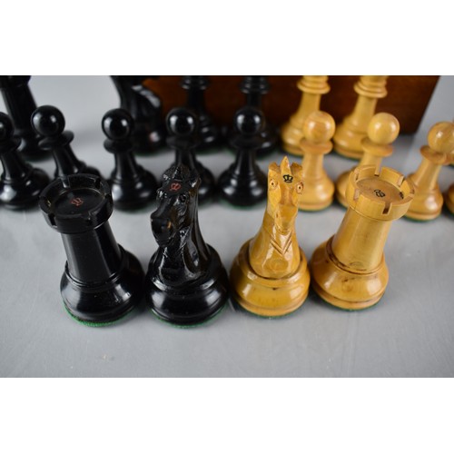 203 - A Staunton Pattern Chess Set having Weighted Pieces, The Knight and Rooks with Crown Stamps, Kings 1... 