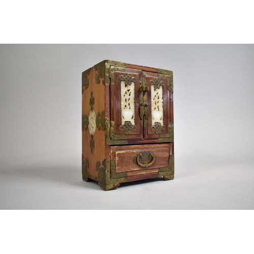 3 - A Mid 20th Century Brass Mounted Chinese Collectors Cabinet, the Hinged Panelled Doors with Faux Jad... 