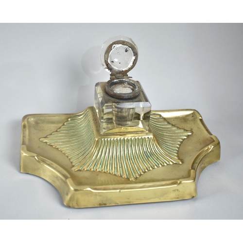 38 - A Late 19th Century Pressed Brass Desktop Inkstand with Glass Bottle, 24cm wide