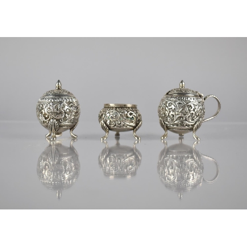 384 - A Persian Silver Three Piece Cruet Set of Globular Form