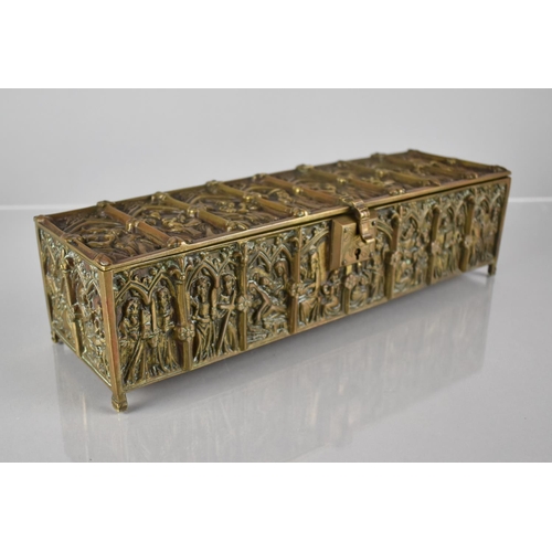 404 - A Late 19th Century Gothic Style Brass Casket decorated in Relief with Religious Figures Under Lance... 