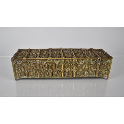 404 - A Late 19th Century Gothic Style Brass Casket decorated in Relief with Religious Figures Under Lance... 