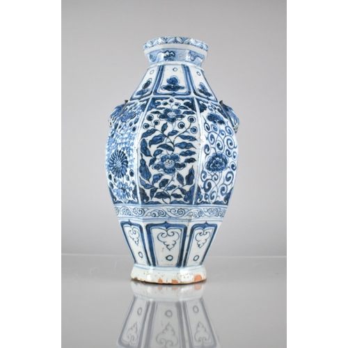 409 - A Blue and White Vase of Octagonal Baluster Form decorated with Floral Panels and Temple Lion Mask H... 