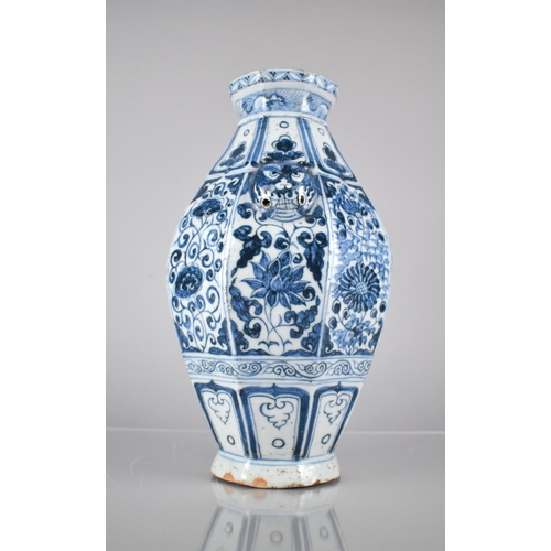 409 - A Blue and White Vase of Octagonal Baluster Form decorated with Floral Panels and Temple Lion Mask H... 