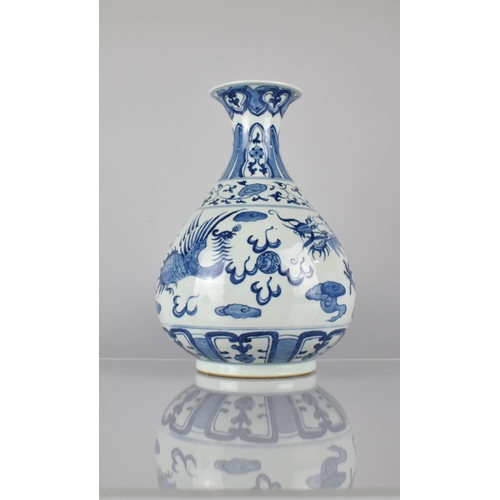 411 - A Chinese Porcelain Blue and White Vase with Flared Tapering Neck to Globular Body decorated with Dr... 