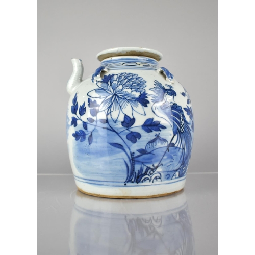 412 - A Chinese Blue and White Teapot decorated with Exotic Bird and Flowers, 19.5cms High