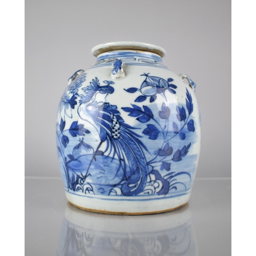 412 - A Chinese Blue and White Teapot decorated with Exotic Bird and Flowers, 19.5cms High