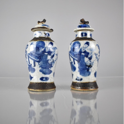 415 - A Pair of Small Chinese Porcelain Crackle Glazed Baluster Vases and Covered decorated with Mother an... 