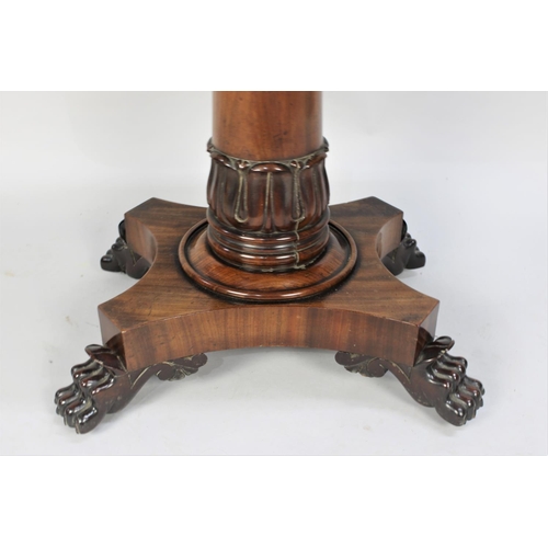 107 - A 19th Century Mahogany Lift and Twist Tea Table in Tapering Turned Supports and Acanthus Carving to... 