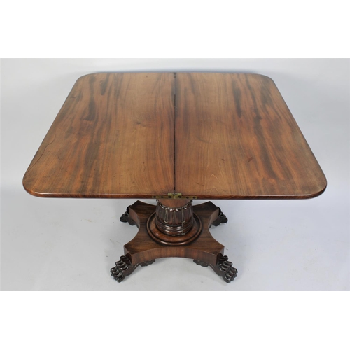 107 - A 19th Century Mahogany Lift and Twist Tea Table in Tapering Turned Supports and Acanthus Carving to... 