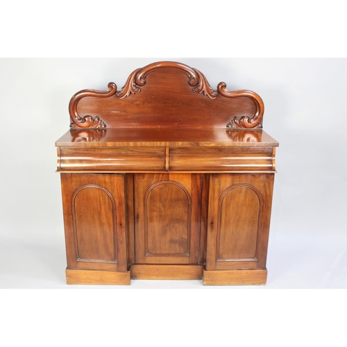 115 - A Victorian Mahogany Sideboard with Two Short Drawers over Inverted Breakfronted Cupboards to Base, ... 