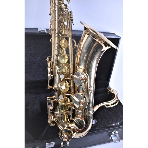 139 - A Cased Brass Tenor Saxophone as Retailed by Johnnie Roachouse Music, Manchester