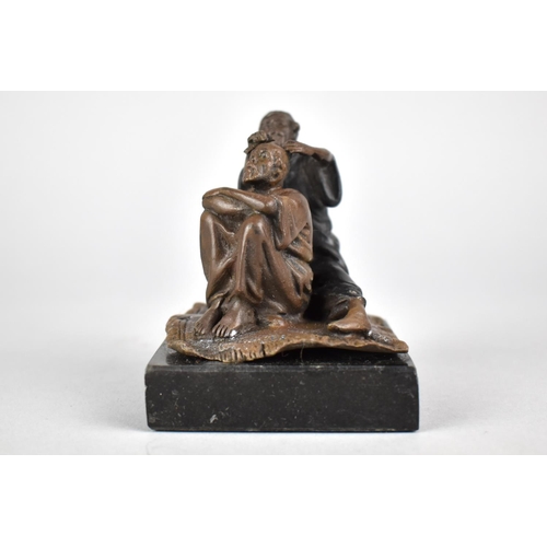 16 - A Bronze Figural Study of Barber and Client Sat on Rug Set on Square Slate Base, 8cms High