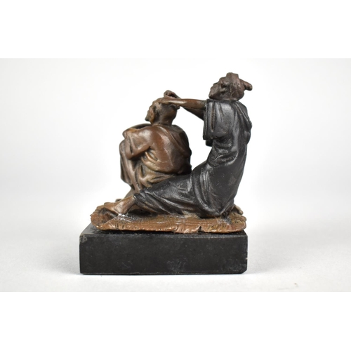 16 - A Bronze Figural Study of Barber and Client Sat on Rug Set on Square Slate Base, 8cms High