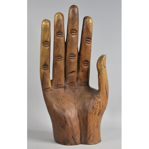 175 - A Large Far Eastern Carved Wooden Study of a Hand, 52cms High