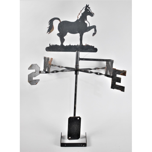 210 - A Late 20th Century Black painted Wrought Iron Weather Vane with Trotting Horse Top, 77cms High