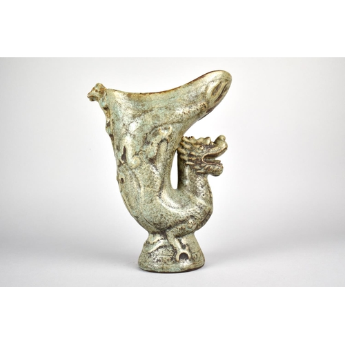 243 - A Reproduction Chinese Celadon Glazed Dragon Vessel, 22.5cm high