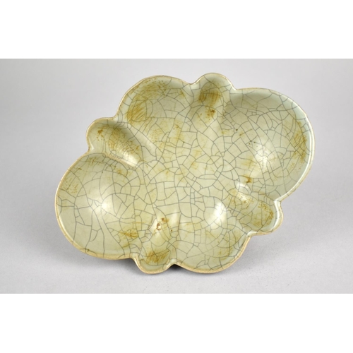 245 - A Reproduction Chinese Celadon Glazed Dish of Reeded Oval Form, 15.5cm wide