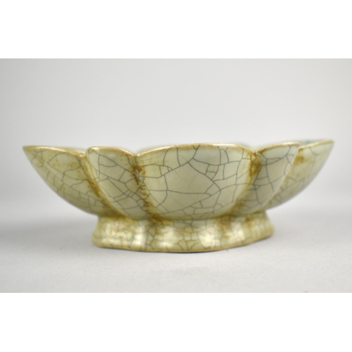 245 - A Reproduction Chinese Celadon Glazed Dish of Reeded Oval Form, 15.5cm wide