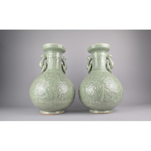 246 - A Large Pair of Celadon Vases of Bottle with Twin Zoomorphic Ring Handles and Decorated in Shallow F... 