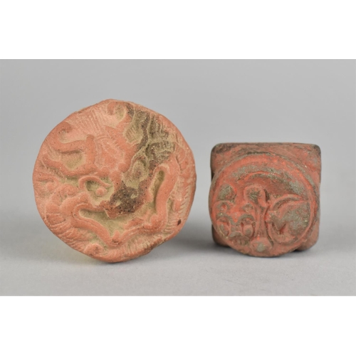 259 - Two Carved Chinese Pottery Items, Dragon Roundel and Temple Lion, 4.5cm diameter