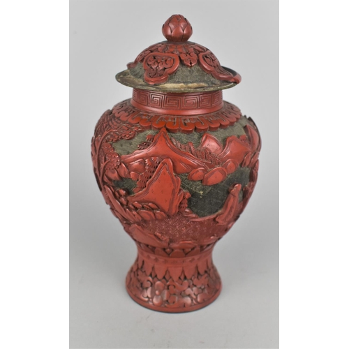 262 - A 19th Century Chinese Cinnabar Vase and Cover Decorated with Figures in Garden Setting, Condition I... 