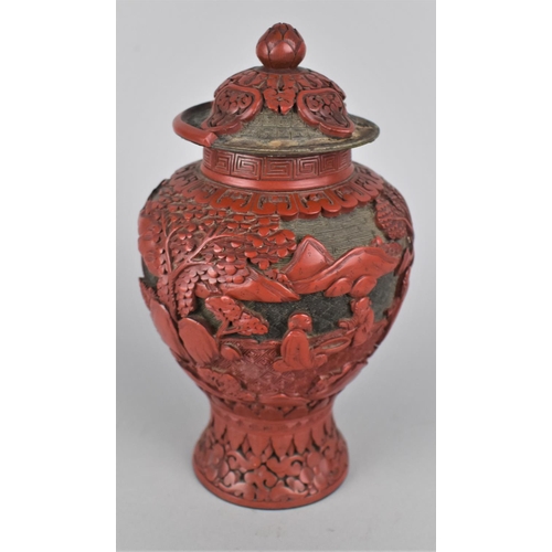 262 - A 19th Century Chinese Cinnabar Vase and Cover Decorated with Figures in Garden Setting, Condition I... 