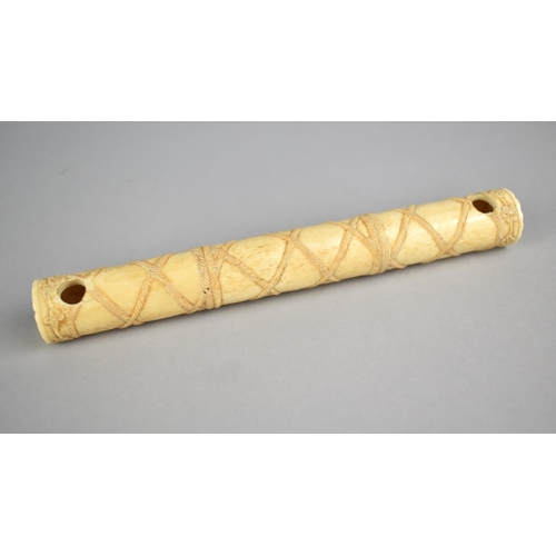 266 - A Reproduction Bone Cylinder Rope Decoration, 19.5cm long