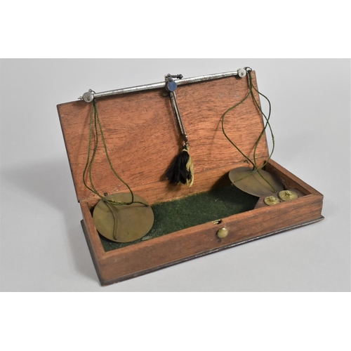 29 - A Mahogany Cased Set of Apothecary or Jeweller's Pan Scales with Two Weights, 17cms Wide