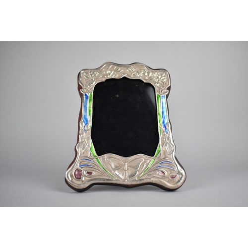 403 - A Reproduction Art Nouveau Silver and Enamelled Photo Frame, 21.5cm high